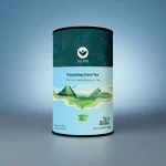 Premium Darjeeling green tea leaves in a cup with loose leaf tea on the side