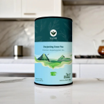 Premium Darjeeling green tea leaves in a cup with loose leaf tea on the side